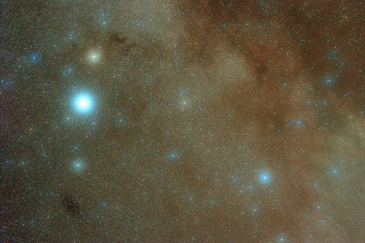 Altair (Alpha Aquilae) with diffusion filter. In this starfield showing many stars of Aquila constellation, the asterism α, β and γ Aquilae (Tarazed) can be easily recognized on the left portion of the image. Tarazed is the yellowish star above the biggest one (Altair). Author: J. Aleu, Public Domain